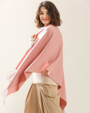 a woman wear a pink cashmere scarf