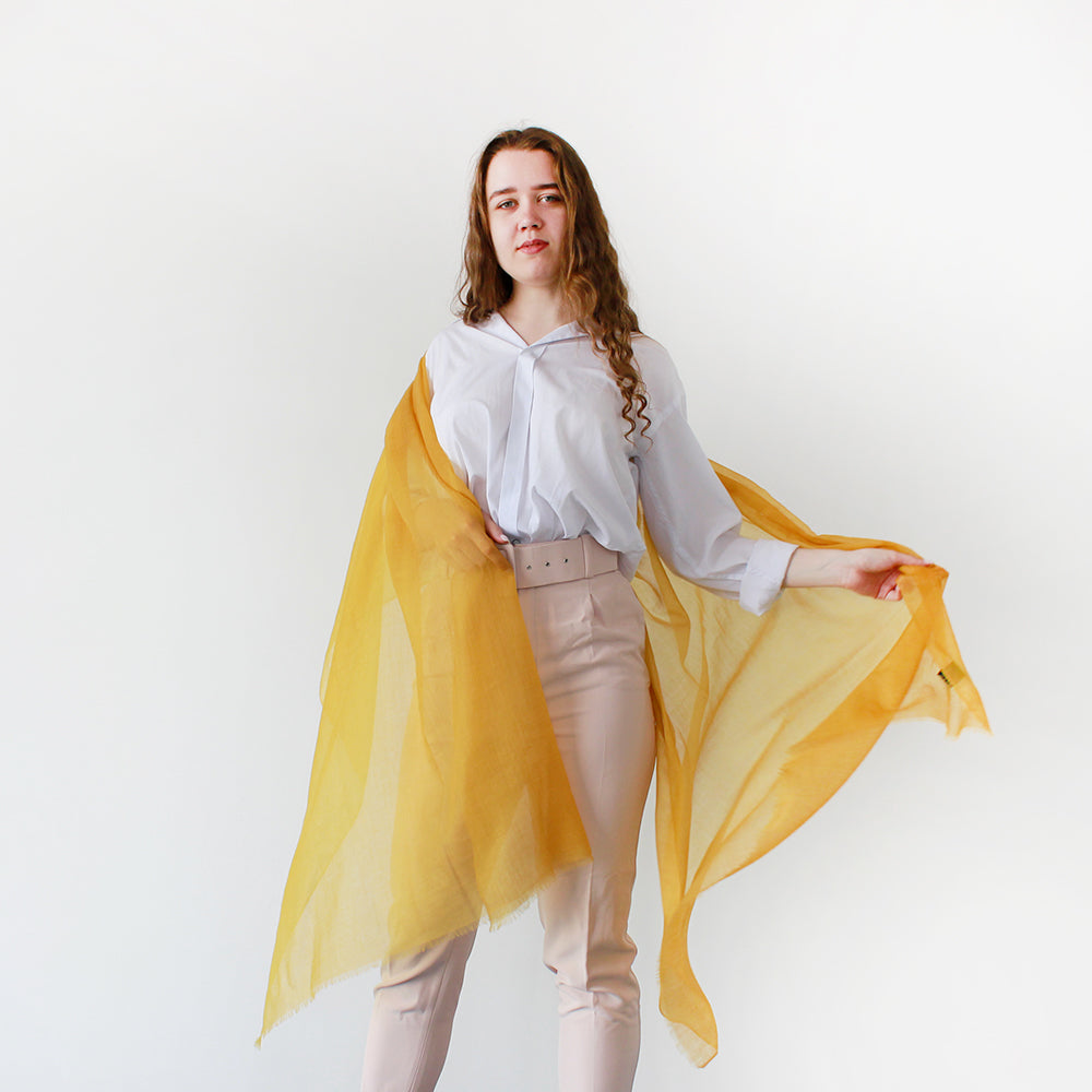 one woman in yellow lightweight scarf