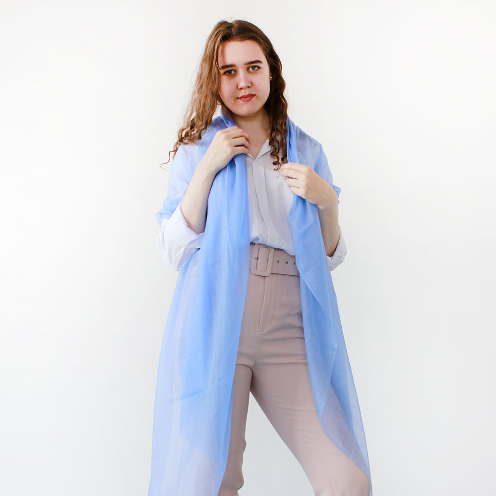 oen girl in light blue scarf