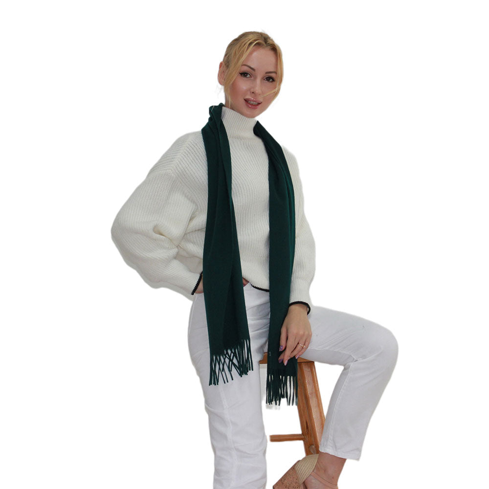 a women with green cashmere scarf