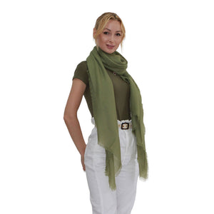one woman with green cashmere scarf