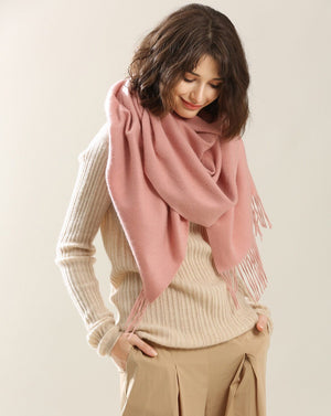 a woman with one pink cashmere wrap